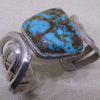 Griffin Tsabetsaye Zuni Sterling Silver Sandcast Kingman Turquoise Bracelet