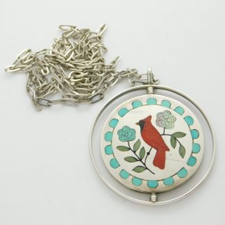 RANDOLPH AND MARGIE GHAHATE Zuni Spinner Sterling Silver and Stone Inlay Bird Pendant
