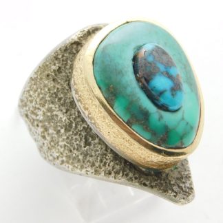 Side view of Charles Loloma Hopi Turquoise, Gold, and Sterling Silver Ring
