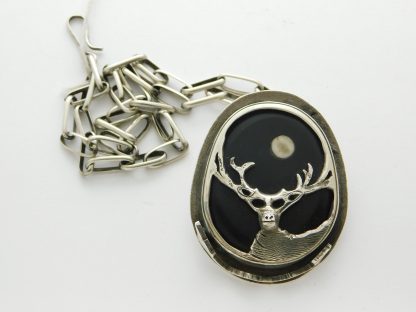 ADAM RAMIREZ Ute / Acoma Pueblo "The Hunters Moon" Sterling Silver, Obsidian, and Horn Pendant