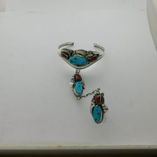 Justin Morris Navajo Turquoise, Coral and Sterling Slave Bracelet