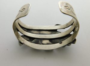 Rear view of Zuni Rainbow Man Stone Inlay and Sterling Silver Bracelet