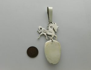 Reverse view of JAMES FENDENHEIM Tohono O’odham Papago Pony Sterling Silver, 14Kt. Gold, Kingman Turquoise Pendant