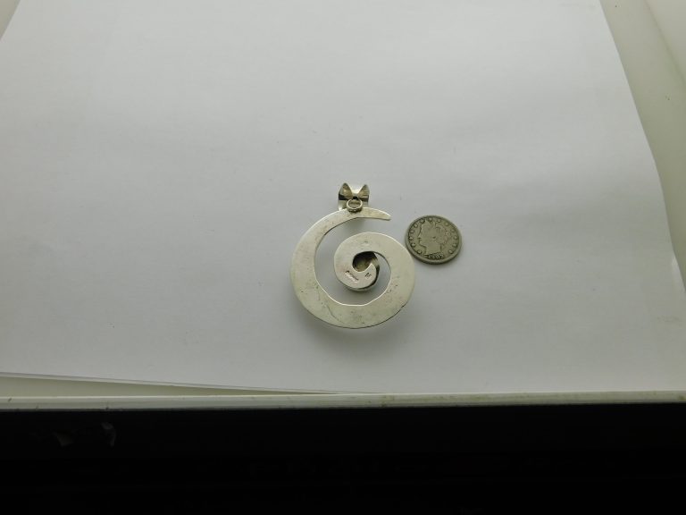Rear view of MILDRED PARKHURST Navajo Sonoran Gold Turquoise Sterling Silver Swirl Pendant