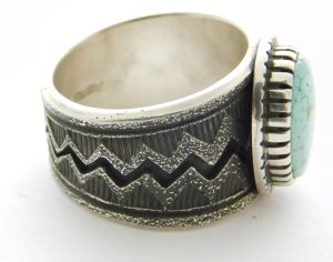 Side view of Aaron John Navajo Tufa Cast Sterling Silver and Turquoise Ring