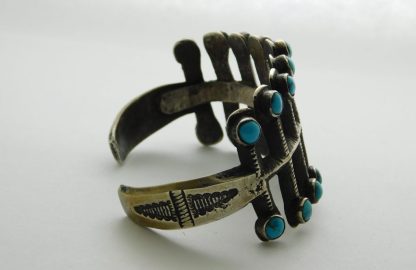 Side view of Jock Favour (Anglo) Tufa Cast Ingot and Turquoise Bracelet