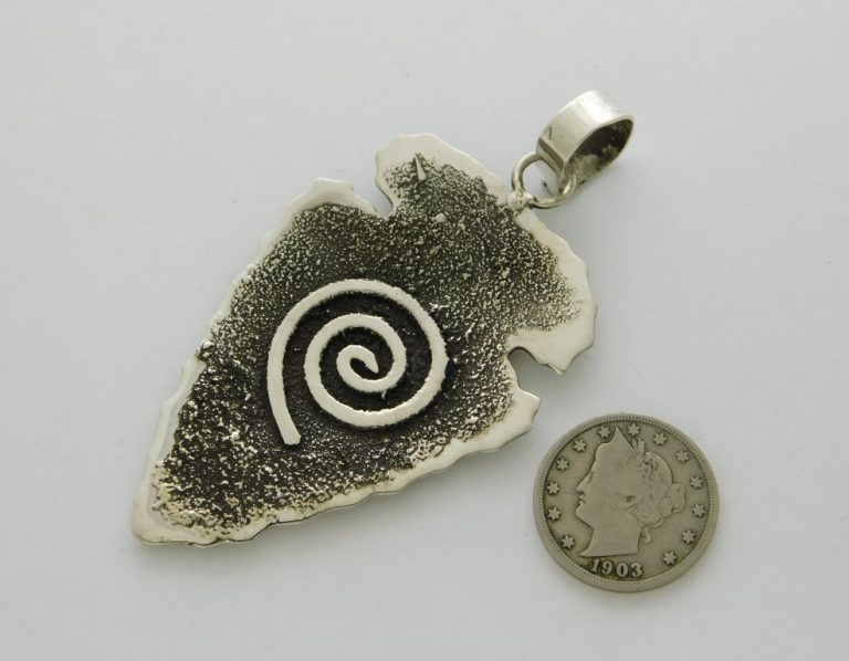 Reverse view of Timm Lewis Navajo Petroglyph Sterling Silver Arrowhead Pendant