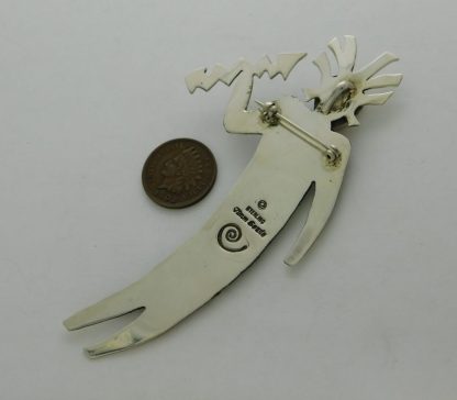 Reverse view of TIMM LEWIS Navajo Tribal Petroglyph Sterling Silver Shaman and Lightening Bolt Pendant