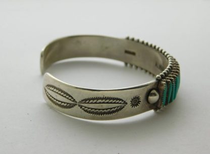 Side view of Bryant Waatsa Jr. Zuni Turquoise Needlepoint Sterling Silver Bracelet