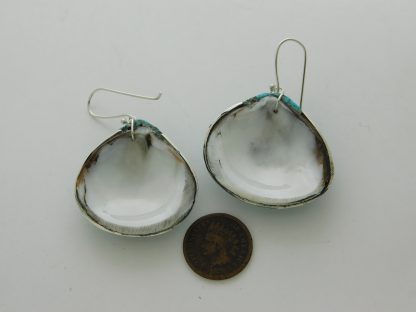 Rear view of Mary Coriz Aguilar and John Aguilar Santo Domingo Four Direction inlay Turquoise & Shell Earrings