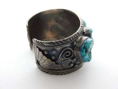 Side view of GIBSON GENE Navajo Sleeping Beauty Turquoise and Sterling Silver "Big Boy" Bracelet Size 8-1/4