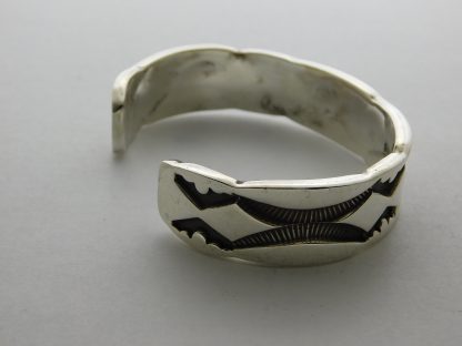 Side view of Nora Tahe Navajo Sterling Silver Bracelet