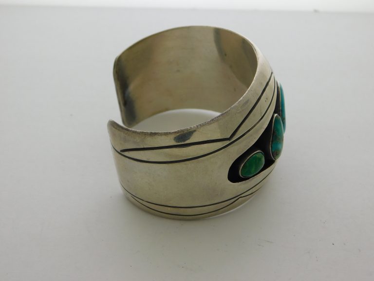 Side view of KENNY JOHN Navajo Silver & Turquoise Bracelet