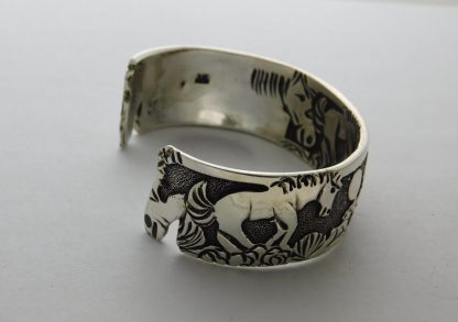 Side view of LLOYD BECENTI Navajo Sterling Silver Horse Bracelet