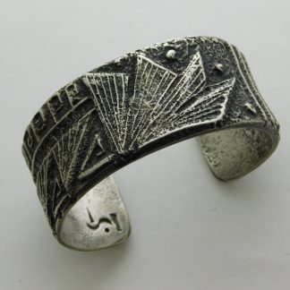 Stewart Billie Navajo Tufa Cast Silver Bracelet