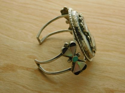 Side view of Leagus & Caroline Ahiyite Zuni Bracelet