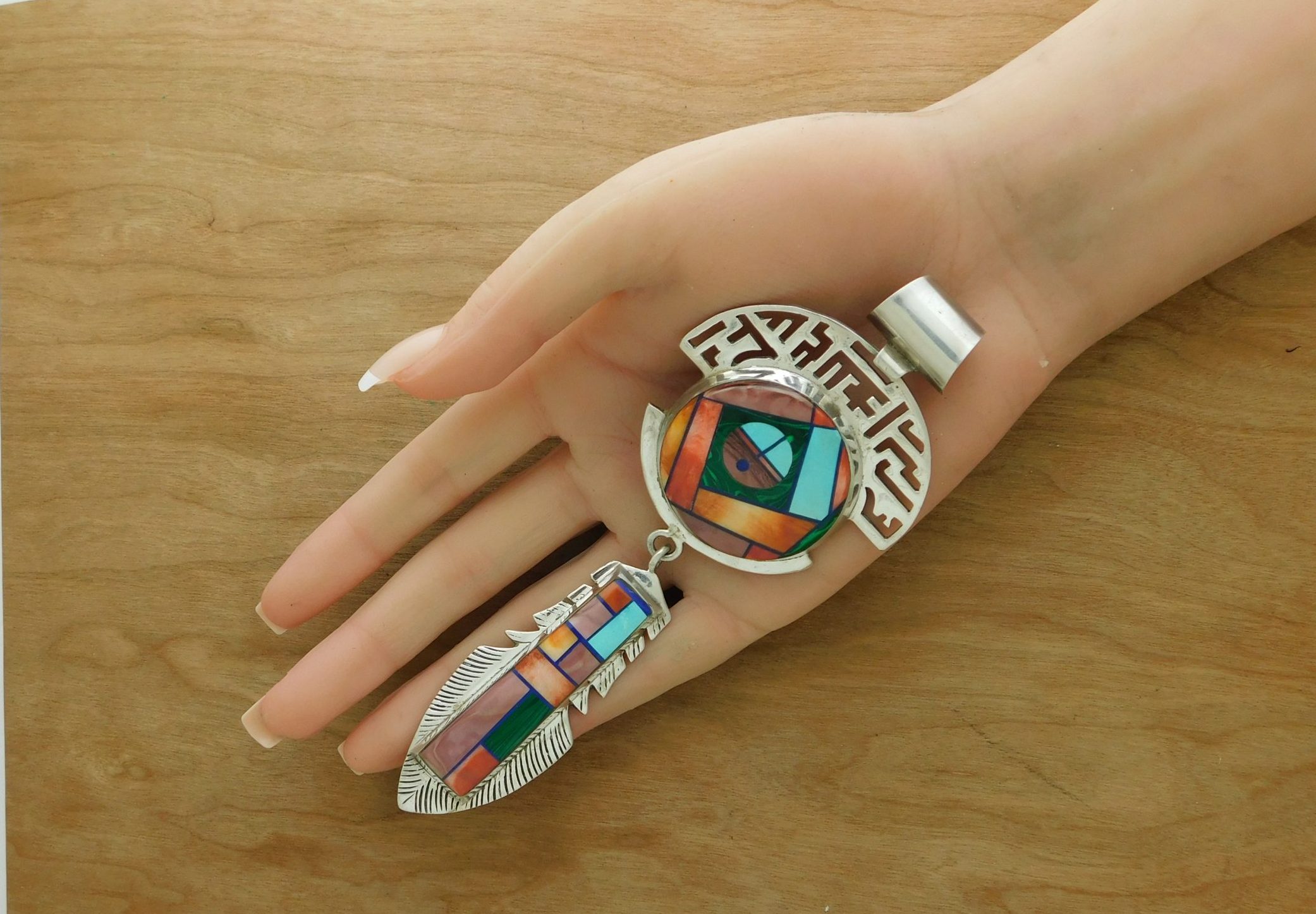 Frank Yellowhorse Navajo Pendant displayed in Hand