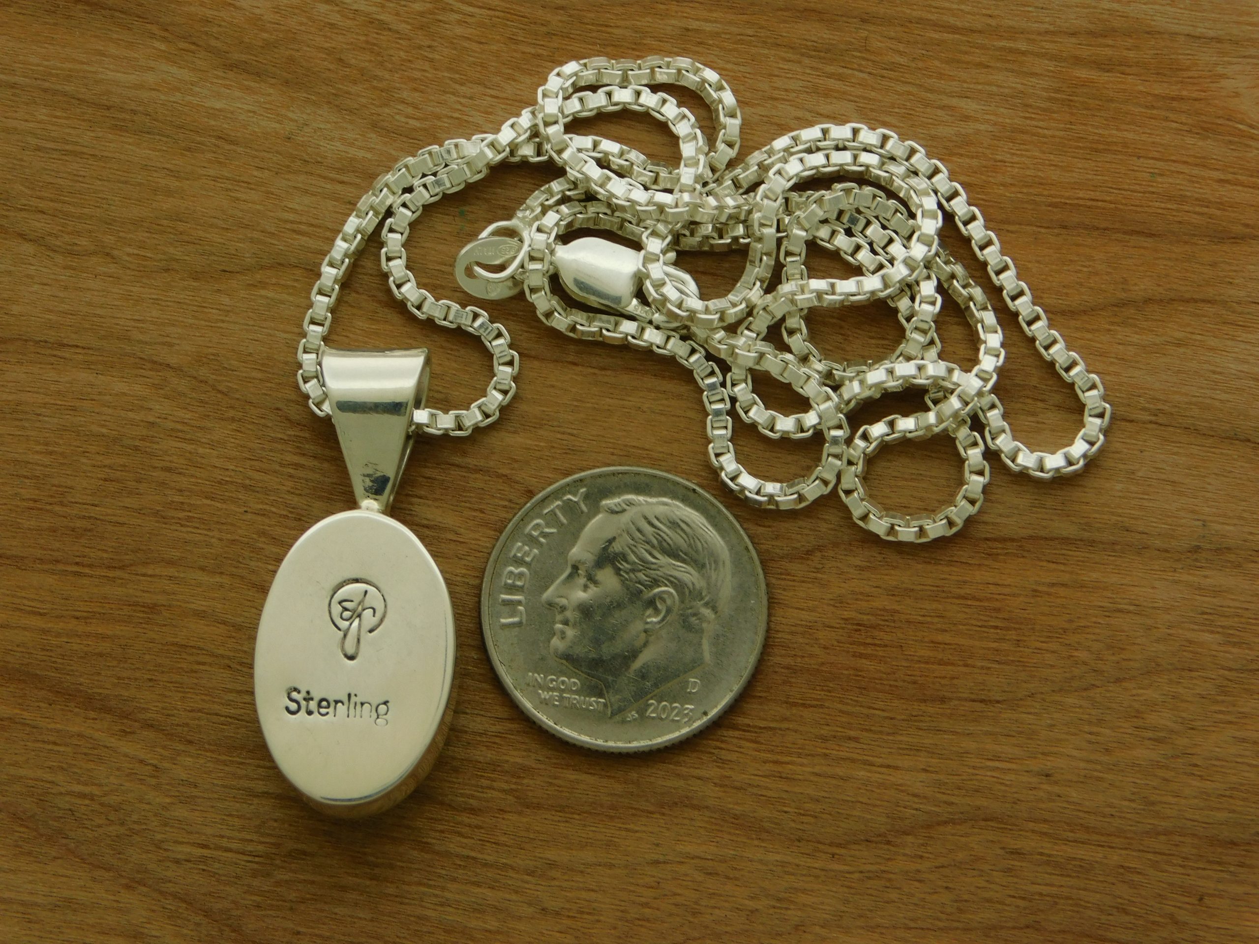 Rear Oval Bisbee Turquoise Pendant