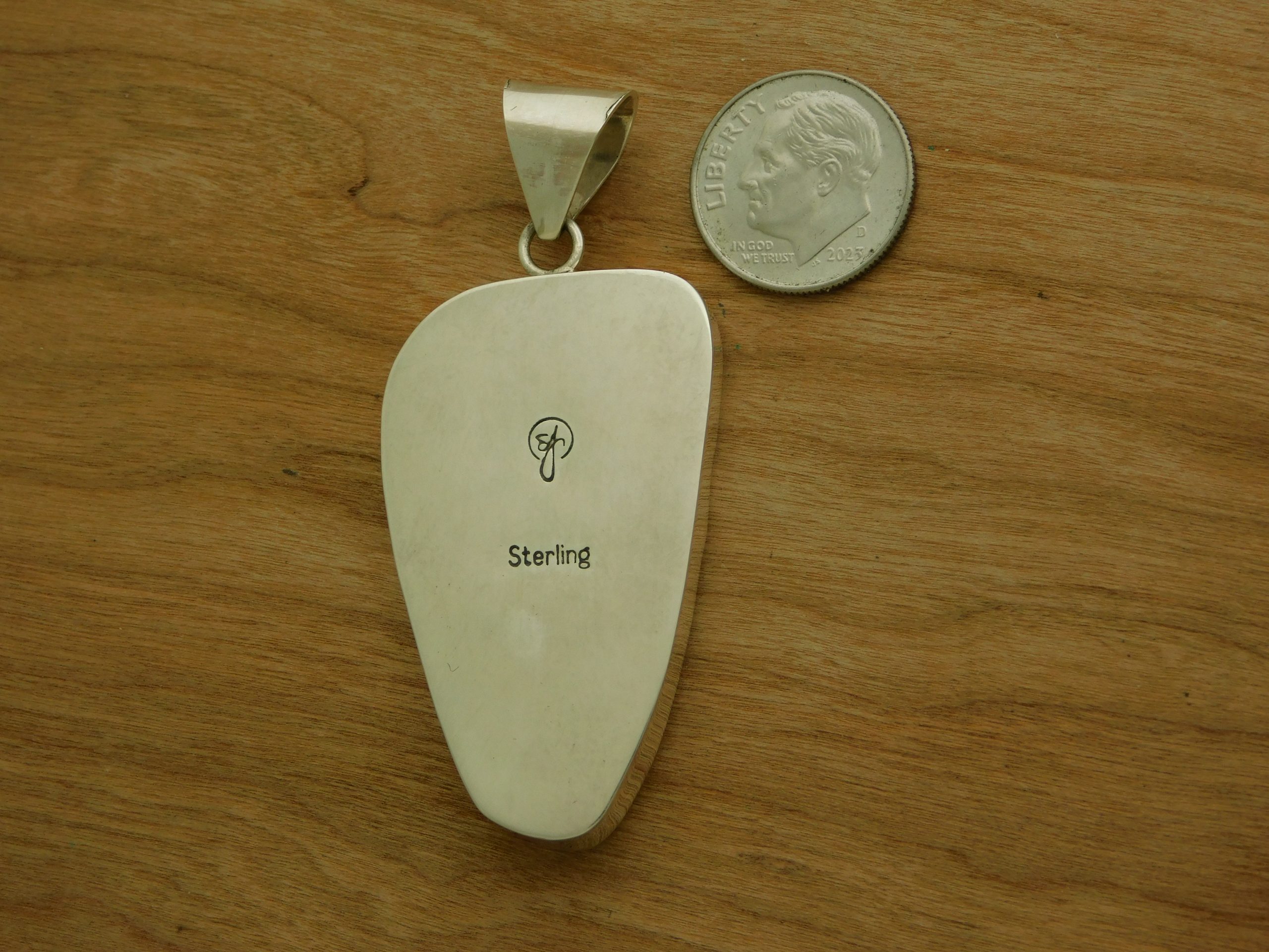 Rear Triangle Bisbee Turquoise Pendant