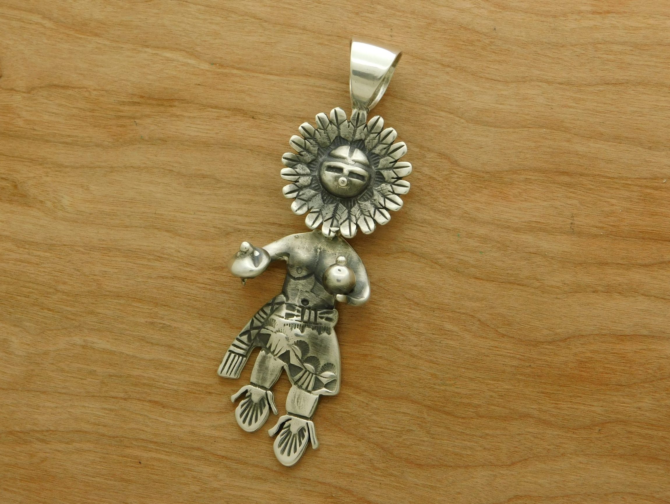 Teddy Silversmith Dine' Sunface Kachina Pendant