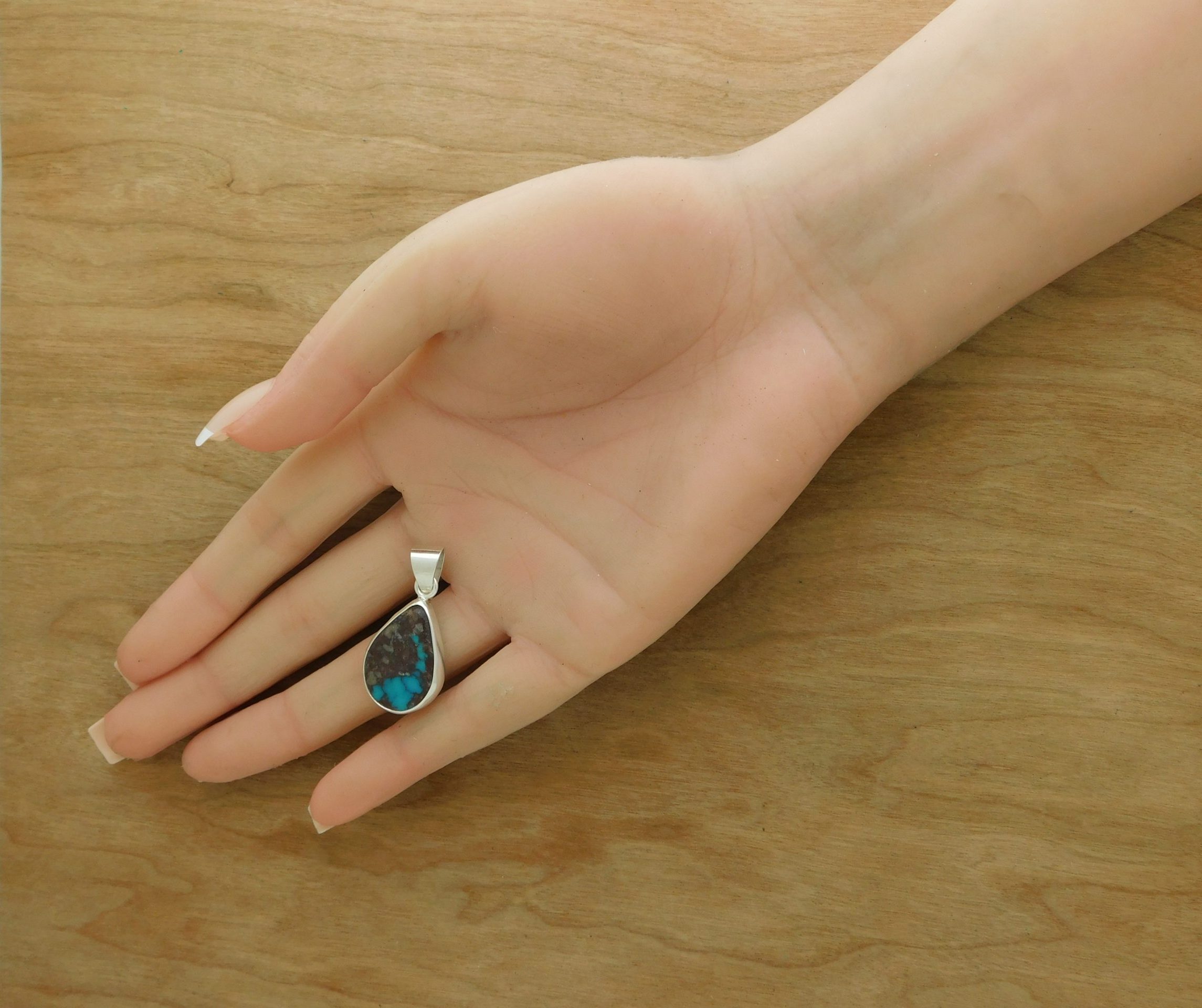 Bisbee Turquoise Scorpion in Hand