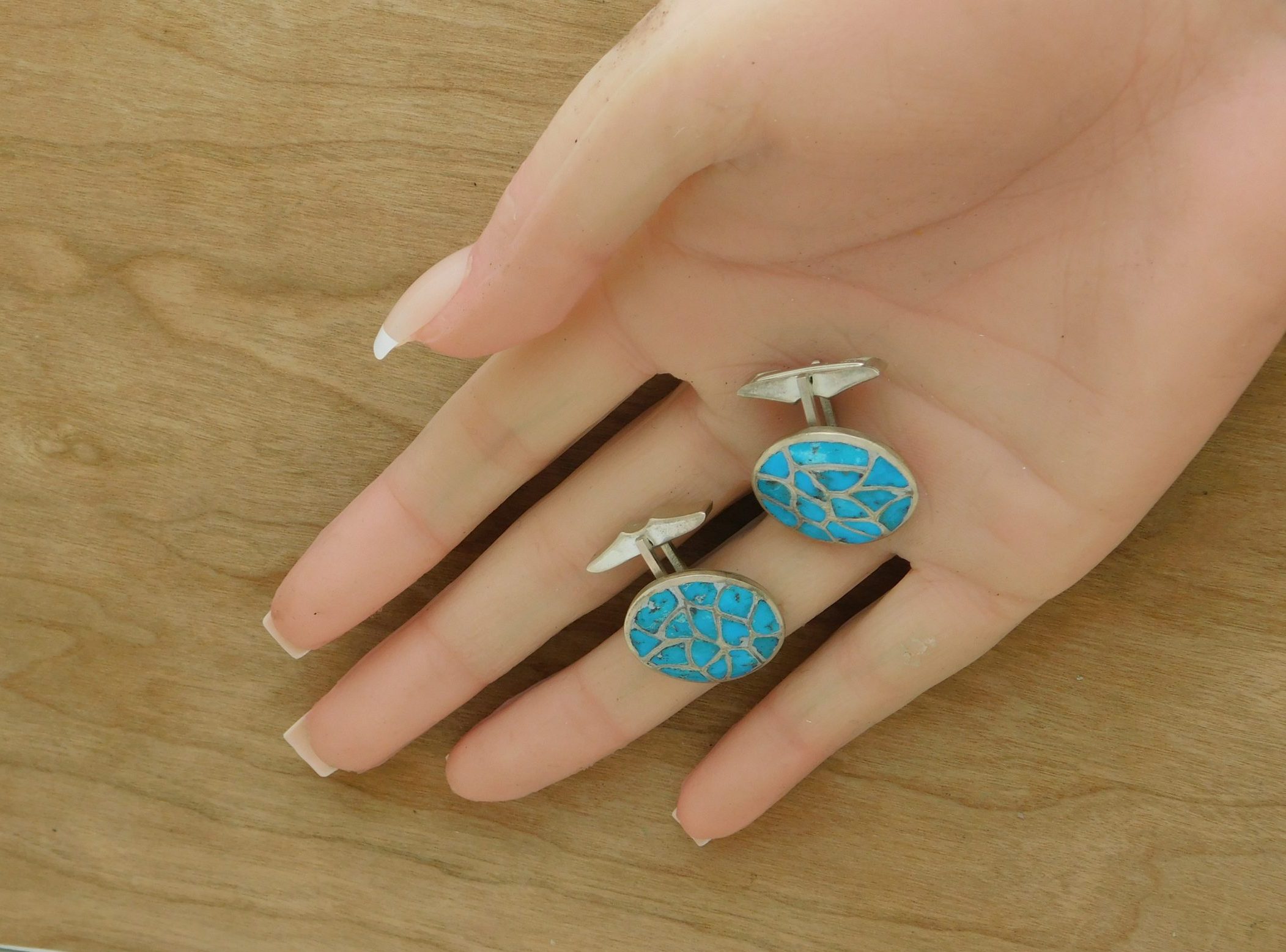 Fred Roby Zuni Cufflinks in Hand